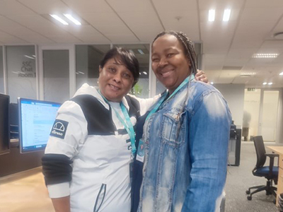 Avril with a work colleague in the Johannesburg office.