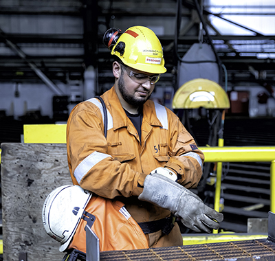 Mohammad wearing welding safety gear.