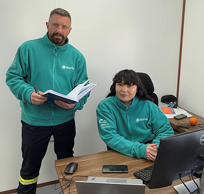 Saihnaa and her manager Paul in the office.