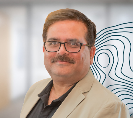 Headshot of Raj Tilak of Worley Consulting.