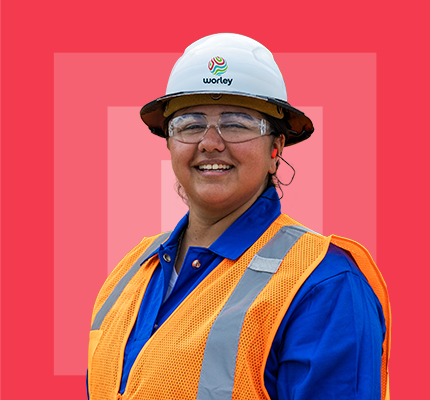 Worley female worker wearing hard hat.