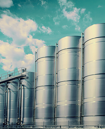 Large steel storage tanks.