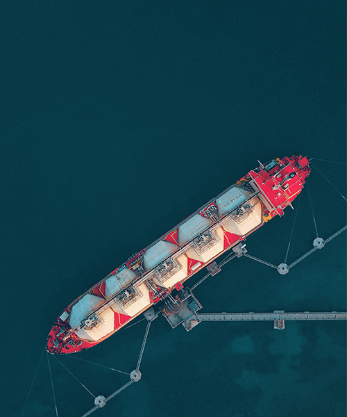 Aerial view of an LNG tanker on the water.