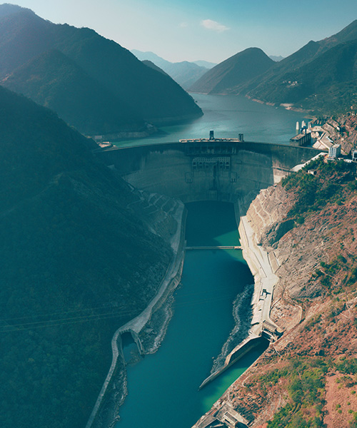 Hydropower plant in the middle of large mountains.