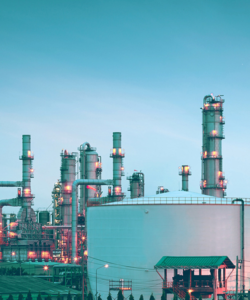 Oil refinery with storage tanks.