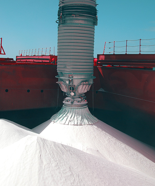 Piles of alumina on a ship.