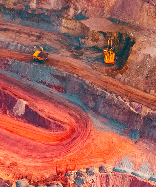 Aerial view of a mine with a mine vehicle.