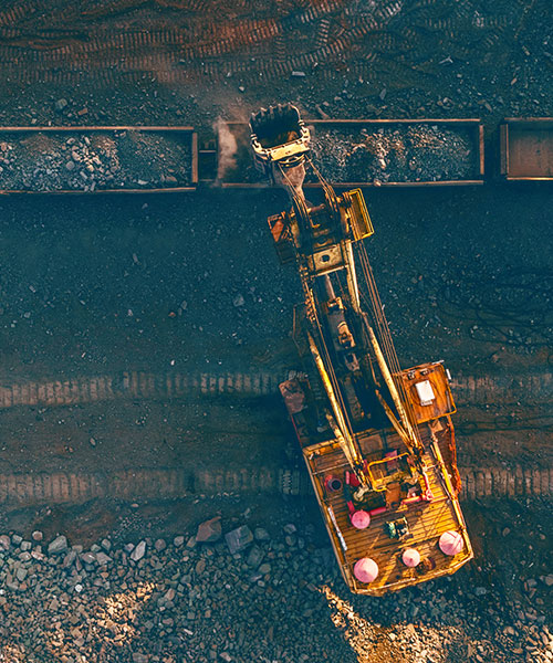 Aerial view of a mining vehicle carrying raw material.