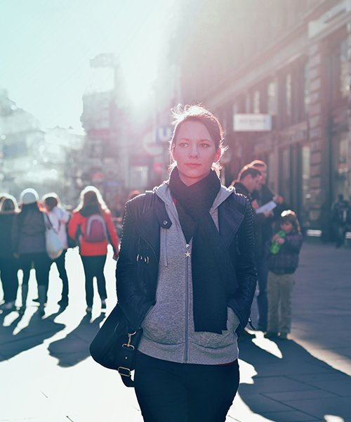 People walking along a city street.