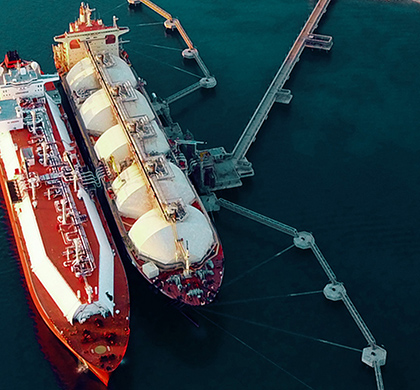 Aerial view of an LNG tanker on the water.