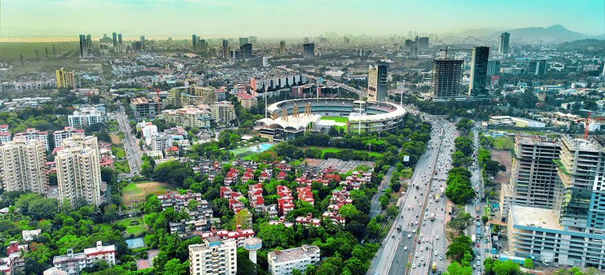 Aerial view of Navi Mumbai skyline, roads and urban development.