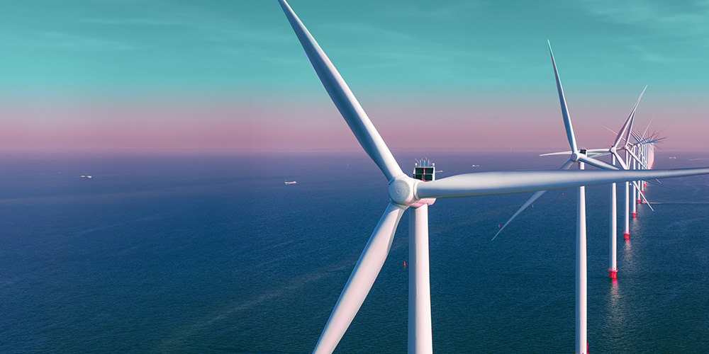 Row of offshore wind turbines.