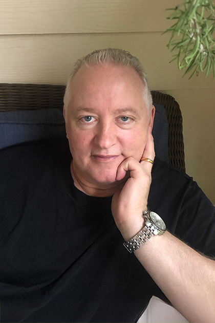 Will sitting on a chair.