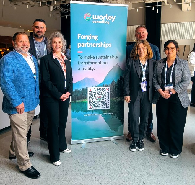 Group of people from Worley Consulting together at the Sustainability Delivery Summit.